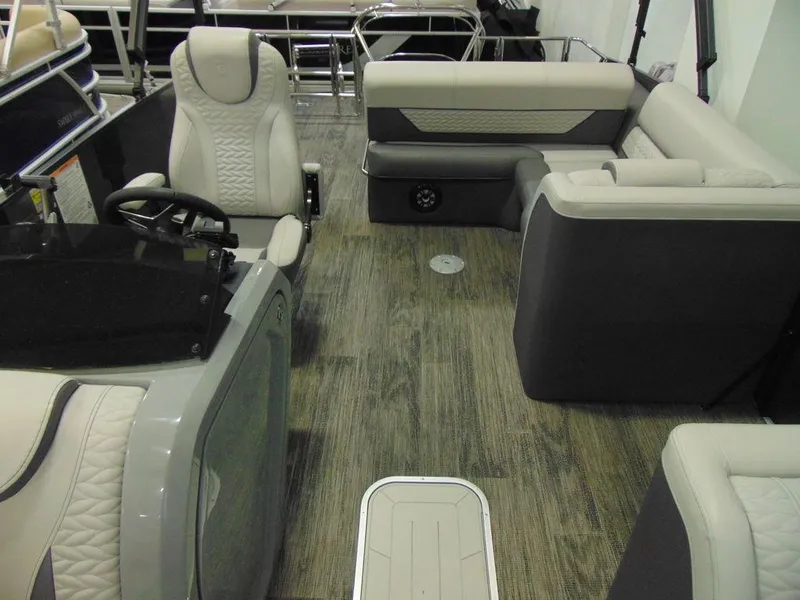Slide: The Image of 2024 Godfrey Monaco 235 SFL iMPACT Package interior with luxurious seating and modern design. - 5