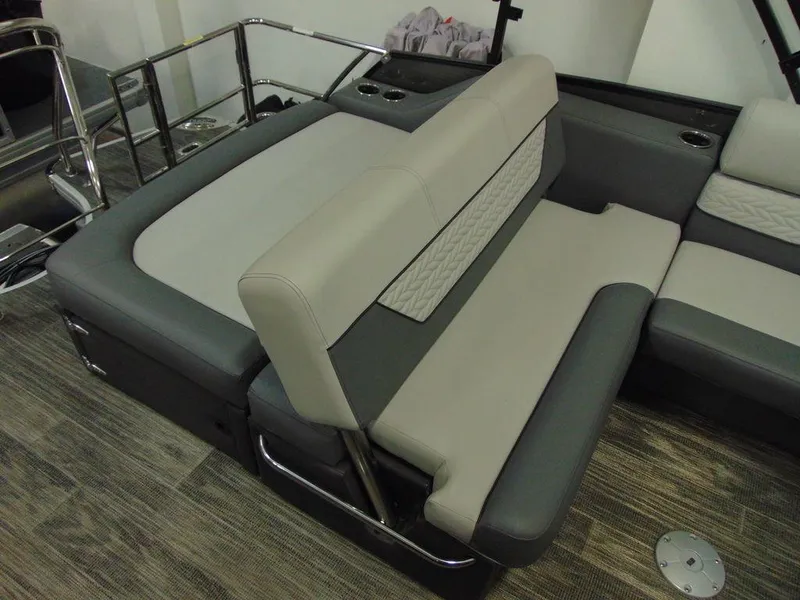 Slide: The Image of 2024 Godfrey Monaco 235 SFL iMPACT Package boat interior seating with gray and beige upholstery. - 7