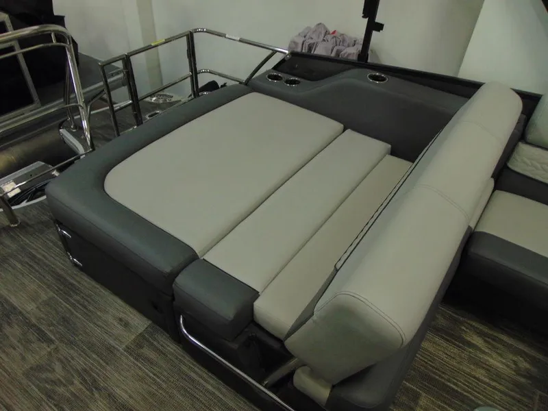 Slide: The Image of 2024 Godfrey Monaco 235 SFL iMPACT Package boat seating area with gray upholstery. - 8