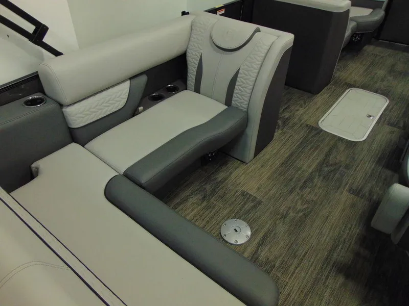 Slide: The Image of 2024 Godfrey Monaco 235 SFL iMPACT Package interior seating with modern design and premium upholstery. - 9