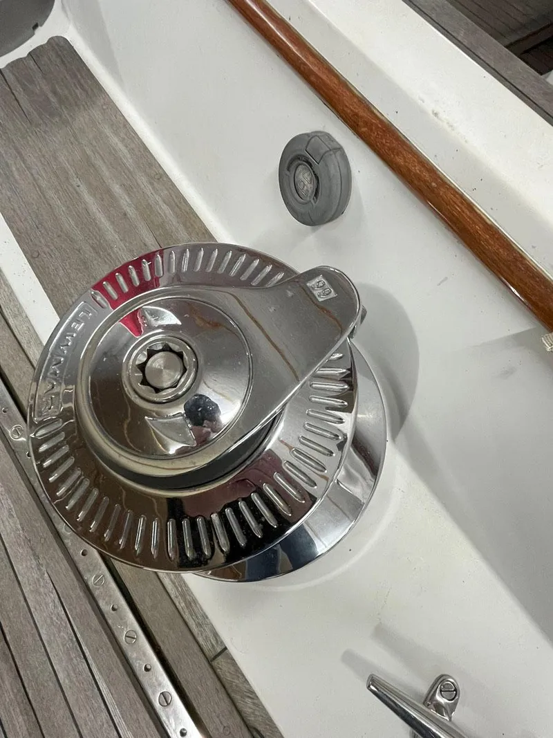 Slide: The Image of Chrome winch on 2001 Hinckley Sou'wester 59 CC sailboat deck. - 16