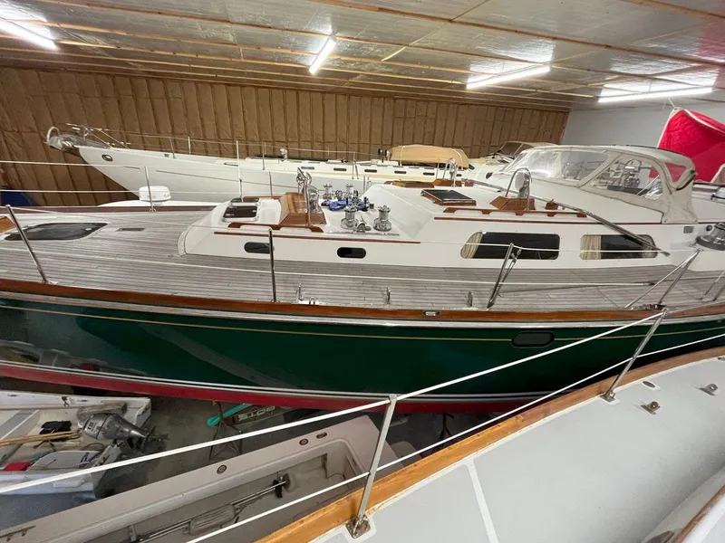 Slide: The Image of Hinckley Sou'wester 59 CC yacht, 2001 model, stored indoors with other boats. - 18