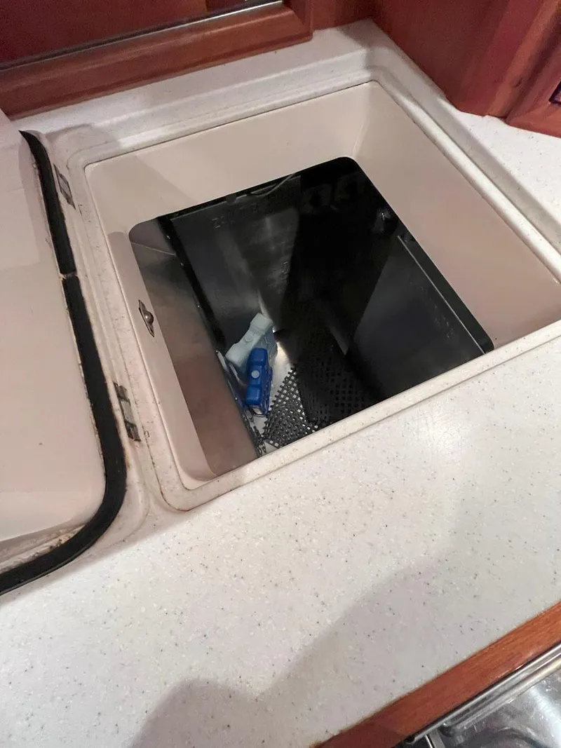 Slide: The Image of Open storage compartment on Hinckley Sou'wester 59 CC yacht, 2001 model. - 35