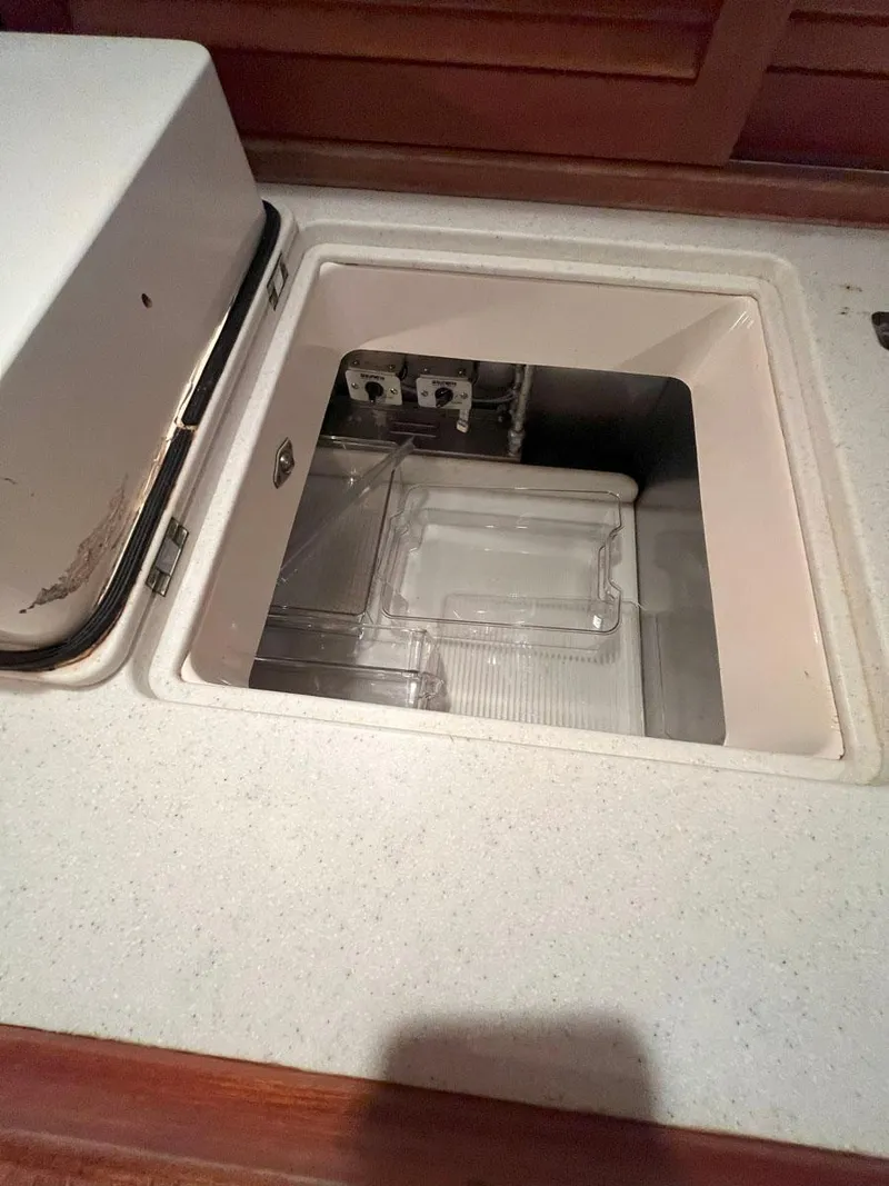 Slide: The Image of Built-in storage compartment on 2001 Hinckley Sou'wester 59 CC yacht. - 36