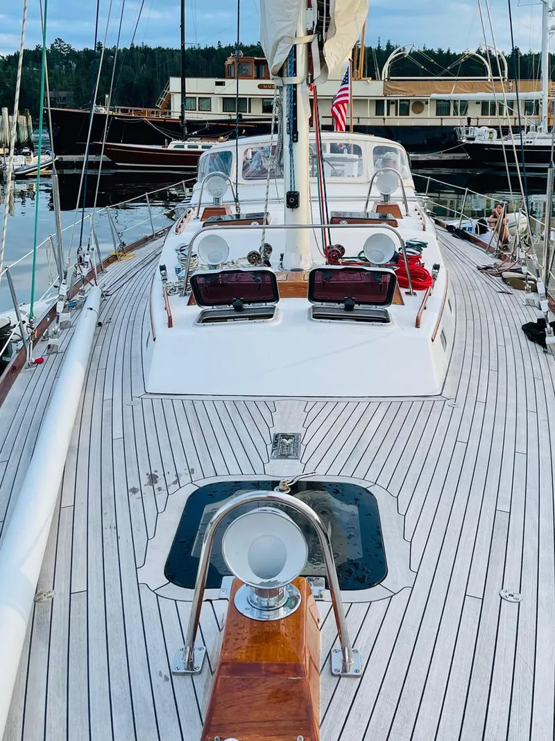 Slide: The Image of Hinckley Sou'wester 59 CC sailboat, 2001 model, docked with wooden deck and nautical equipment. - 5