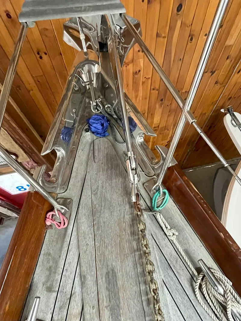 Slide: The Image of Deck of 2001 Hinckley Sou'wester 59 CC sailboat with wooden finish and metal fittings. - 7