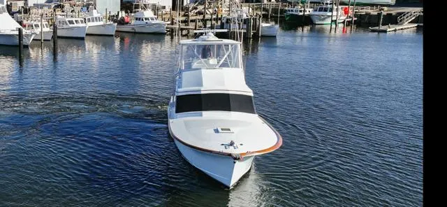 Slide: The Image of 1984 Custom Carolina Buddy Davis boat Full Circle in dry dock. - 11