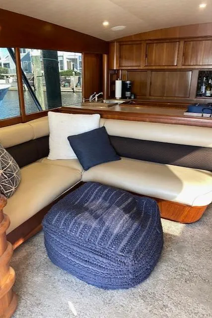 Slide: The Image of 1984 Custom Carolina Buddy Davis yacht interior with cozy seating and modern kitchen. - 19