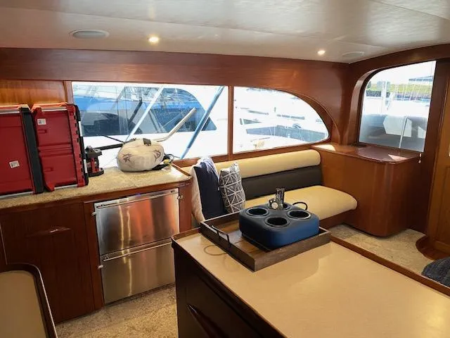 Slide: The Image of Interior of 1984 Custom Carolina Buddy Davis yacht with modern amenities and large windows. - 20
