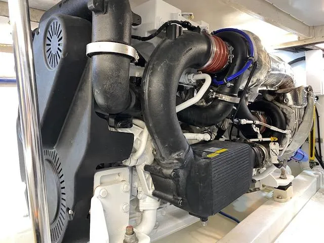 Slide: The Image of Engine of a 1984 Custom Carolina Buddy Davis boat. - 47