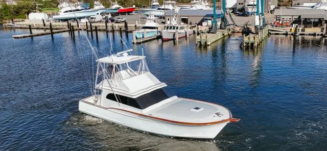 Slide: The Image of 1984 Custom Carolina Buddy Davis boat on stands in a boatyard. - 6