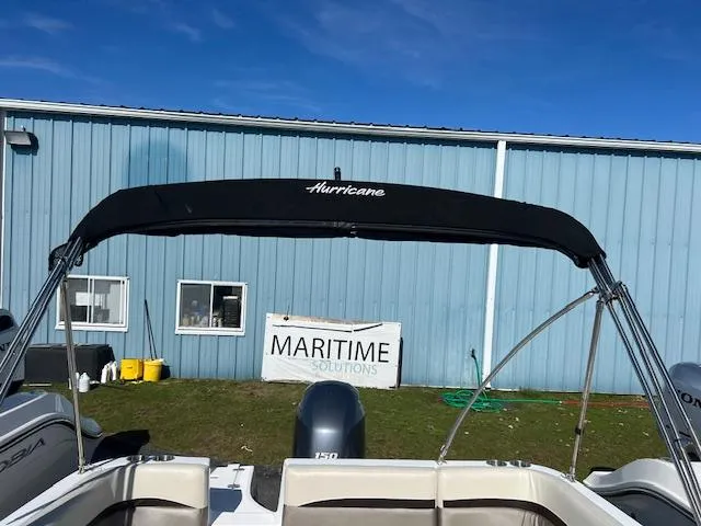 Slide: The Image of 2018 Hurricane SunDeck 2200 DC OB boat with bimini top at Maritime Solutions. - 3