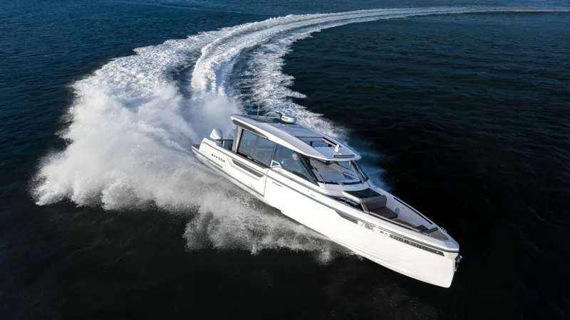 Slide: The Image of Saxdor 400 GTC 2026, sleek boat cruising on water. - 22