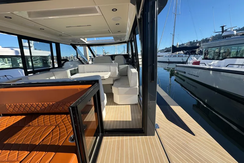 Slide: The Image of Luxurious interior of 2026 Saxdor 400 GTC yacht, featuring elegant seating and modern design. - 29