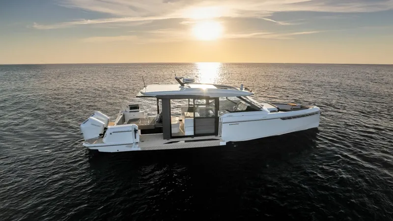 Slide: The Image of 2025 Saxdor 400 GTC yacht on open sea at sunset. - 31