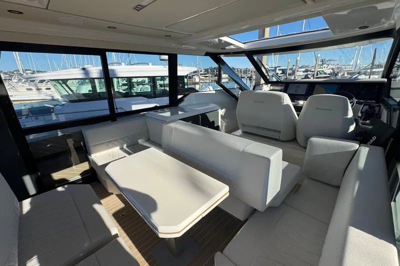 Slide: The Image of Luxurious interior of 2026 Saxdor 400 GTC yacht with modern seating and helm. - 37