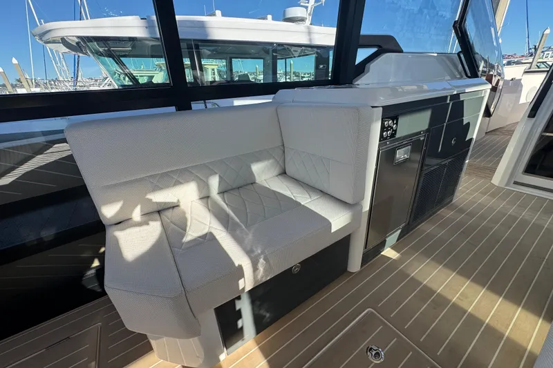 Slide: The Image of Luxurious interior seating on the 2026 Saxdor 400 GTC yacht, featuring modern design and comfort. - 39