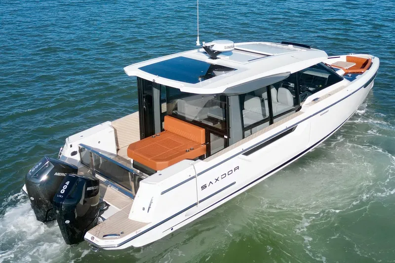Slide: The Image of 2026 Saxdor 400 GTC luxury boat cruising on open water. - 4