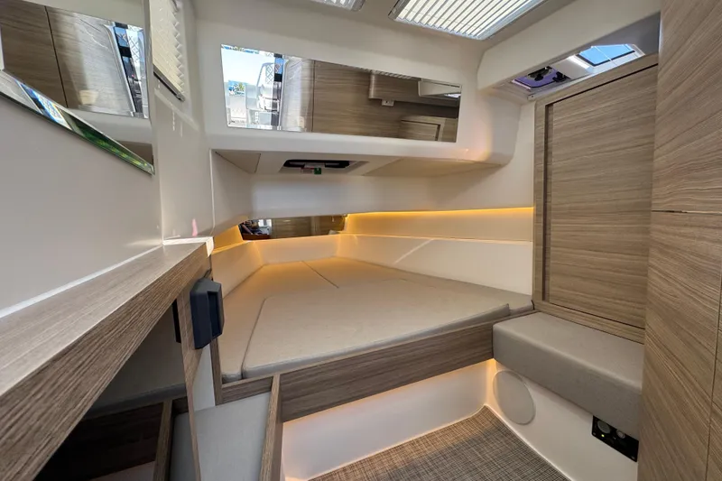 Slide: The Image of Modern interior of 2026 Saxdor 400 GTC boat cabin with sleek wood finishes. - 44