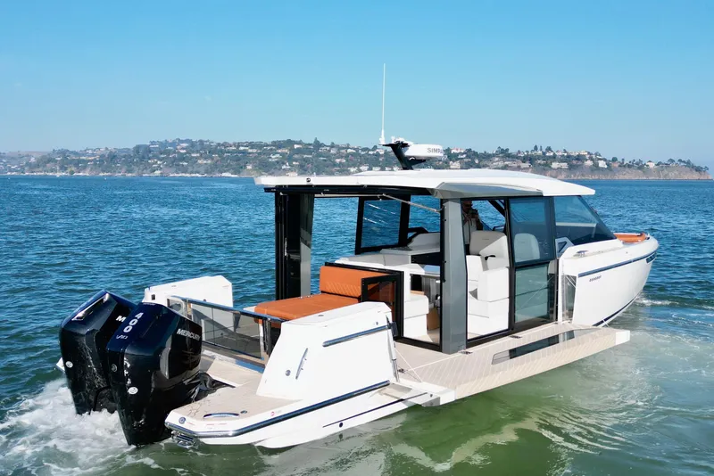 Slide: The Image of 2026 Saxdor 400 GTC luxury boat cruising on open water. - 7