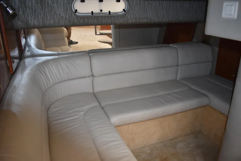 Slide: The Image of 2004 Formula 34 PC yacht interior with beige leather seating and modern design. - 15
