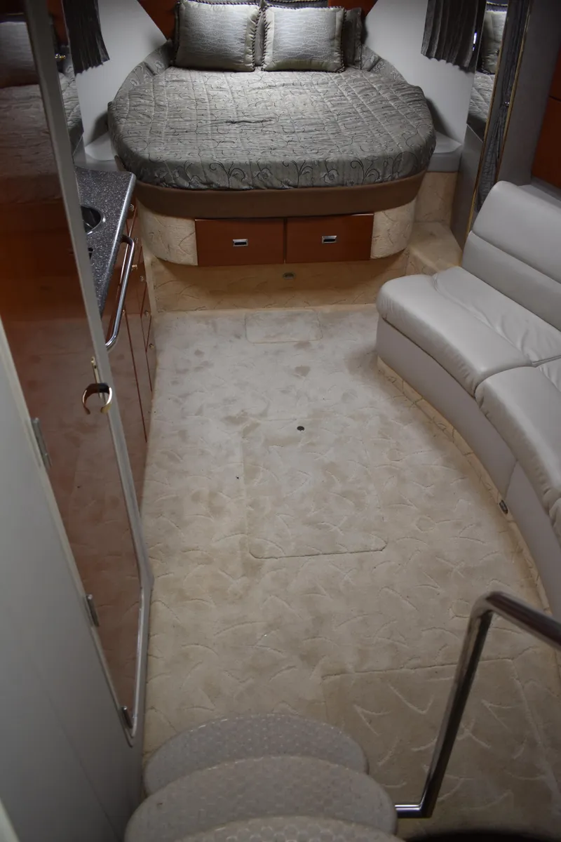 Slide: The Image of Interior of 2004 Formula 34 PC yacht with bed, sofa, and kitchenette. - 5