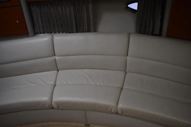 Slide: The Image of 2004 Formula 34 PC yacht interior with curved beige leather seating. - 8