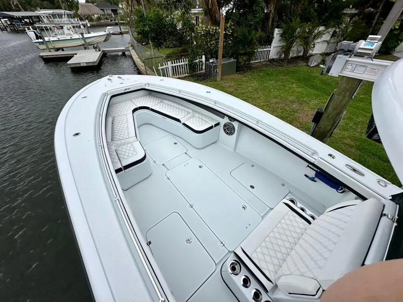 Slide: The Image of 2024 Yellowfin 36 boat with spacious seating and storage compartments. - 21