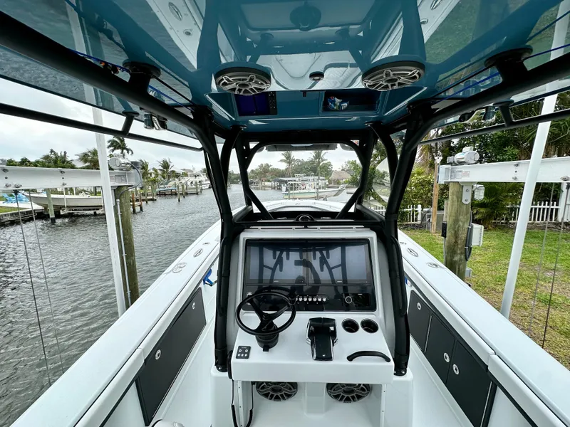 Slide: The Image of 2024 Yellowfin 36 boat cockpit with advanced navigation system. - 8
