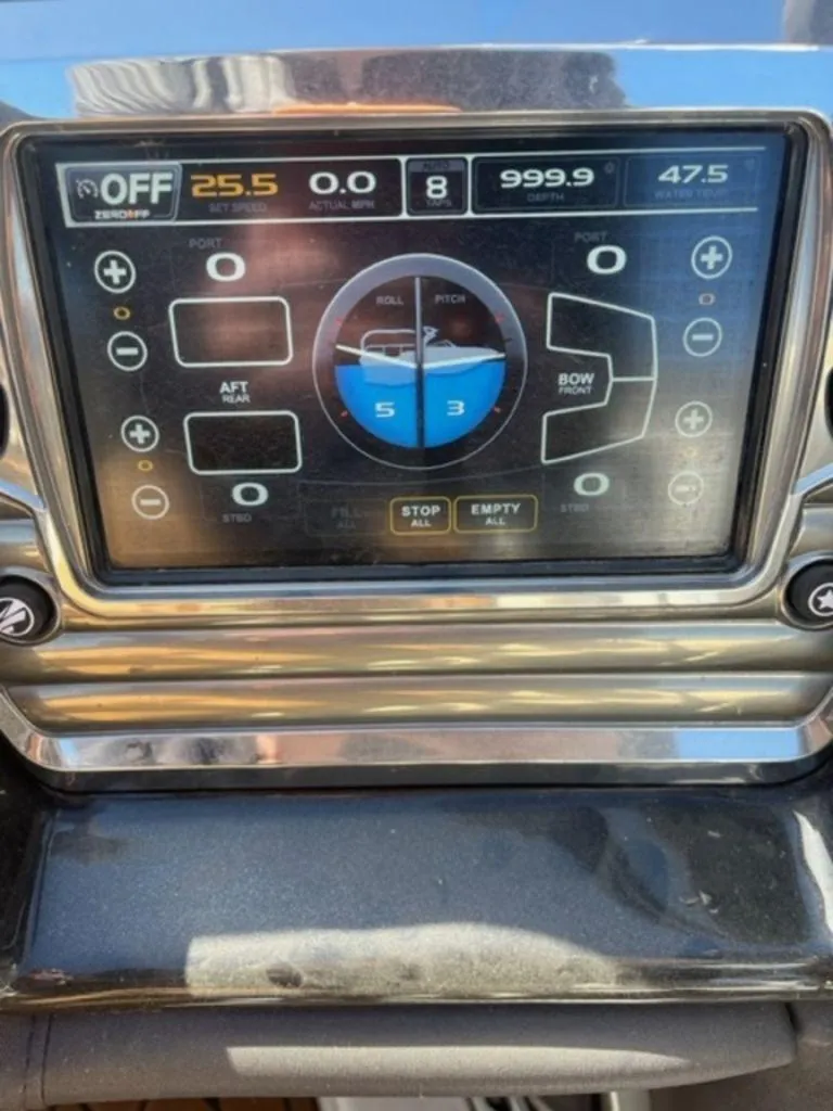 Slide: The Image of Tigé RZX 2016 boat control panel displaying speed, depth, and water temperature. - 2