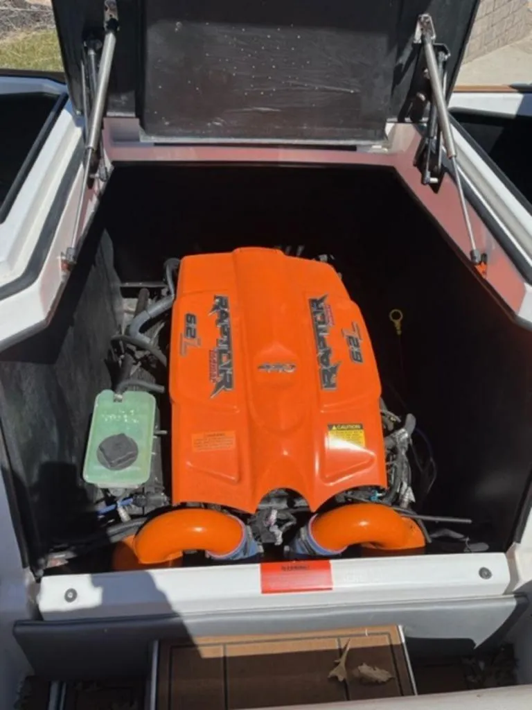 Slide: The Image of 2016 Tigé RZX boat with Raptor 6.2L engine. - 6