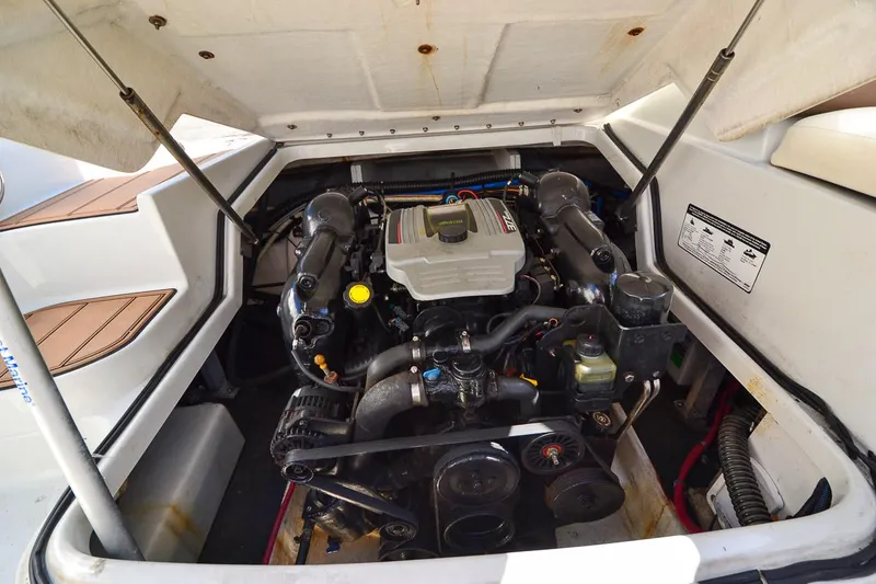 Slide: The Image of 2014 Crownline Eclipse E6 boat engine compartment with open hatch. - 16