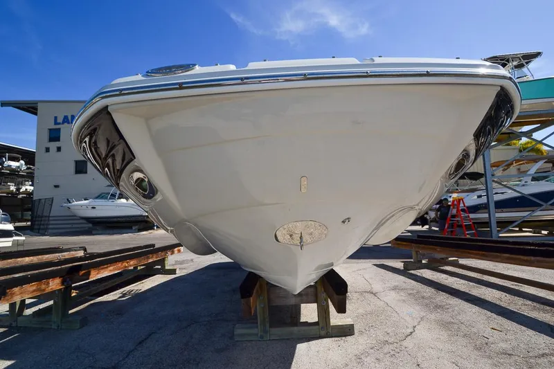 Slide: The Image of 2014 Crownline Eclipse E6 boat on dry dock, front view. - 8