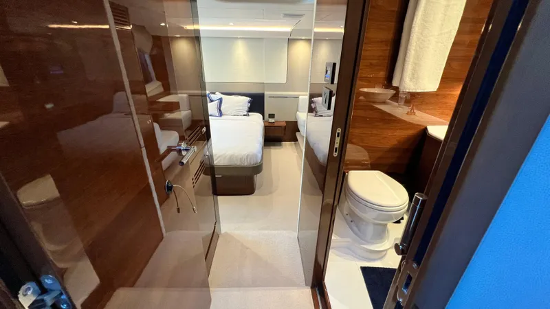 Slide: The Image of Luxurious interior of 2019 Princess F62 yacht featuring bedroom and bathroom. - 18