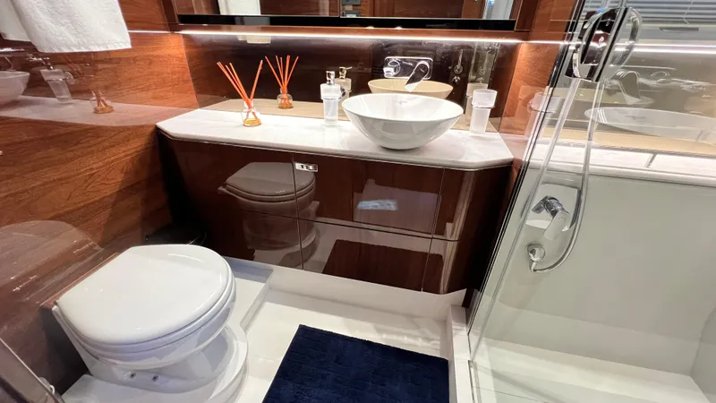 Slide: The Image of Luxurious bathroom in 2019 Princess F62 yacht with modern fixtures and elegant design. - 22