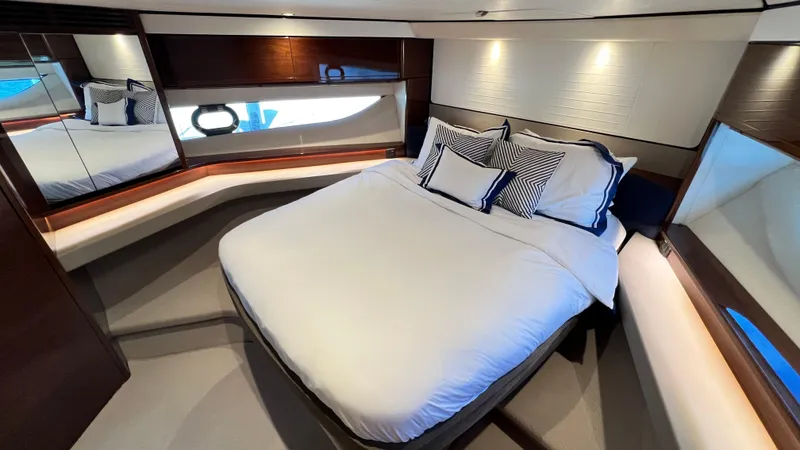 Slide: The Image of Luxurious bedroom interior of 2019 Princess F62 yacht with elegant bedding and modern design. - 24