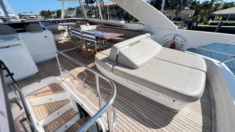 Slide: The Image of Luxurious 2019 Princess F62 yacht deck with seating and dining area. - 36