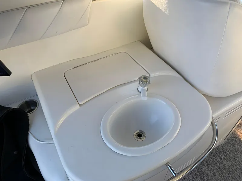 Slide: The Image of 1997 Sea Ray 370 Sundancer boat sink and countertop. - 19