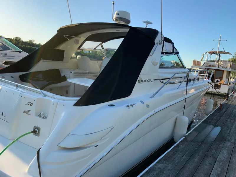 Slide: The Image of 1997 Sea Ray 370 Sundancer yacht docked at marina. - 3