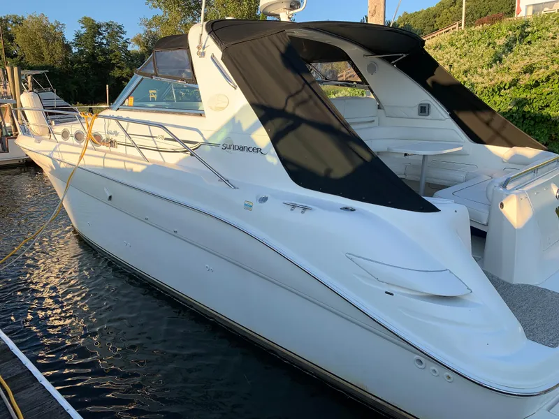 Slide: The Image of 1997 Sea Ray 370 Sundancer yacht docked at marina. - 4