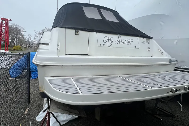 Slide: The Image of 1997 Sea Ray 370 Sundancer boat with My Middle name on the stern. - 7