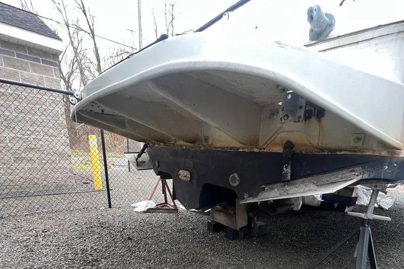 Slide: The Image of 1997 Sea Ray 370 Sundancer boat hull on dry dock. - 8