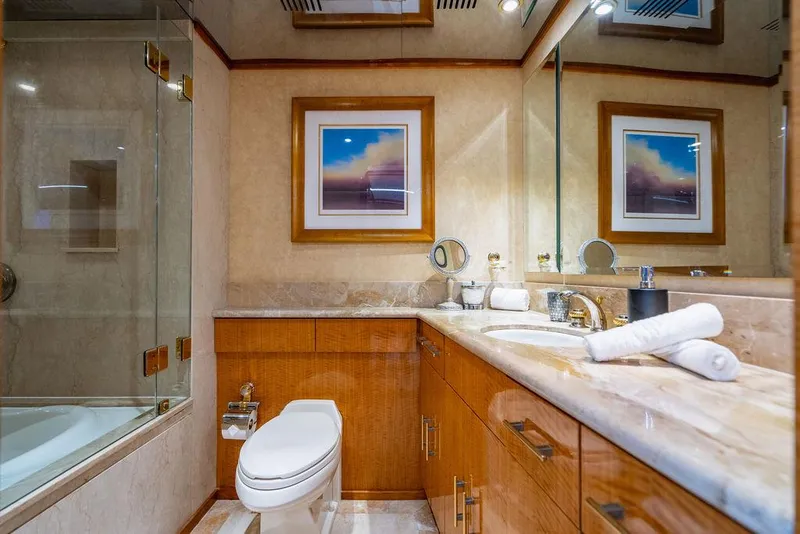 Slide: The Image of Luxurious master bedroom on a 2001 Intermarine Raised Pilothouse yacht. - 12