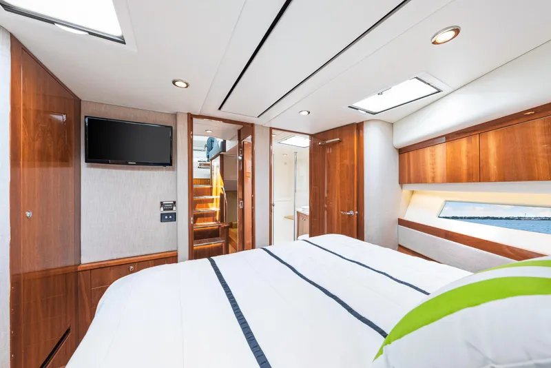 Slide: The Image of Luxurious bedroom interior of 2017 Riviera 575 SUV yacht with modern amenities. - 48