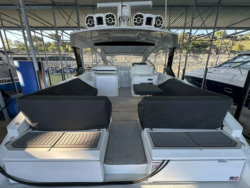 Slide: The Image of 2021 Cruisers Yachts 39 Express Coupe interior with modern seating and helm. - 10