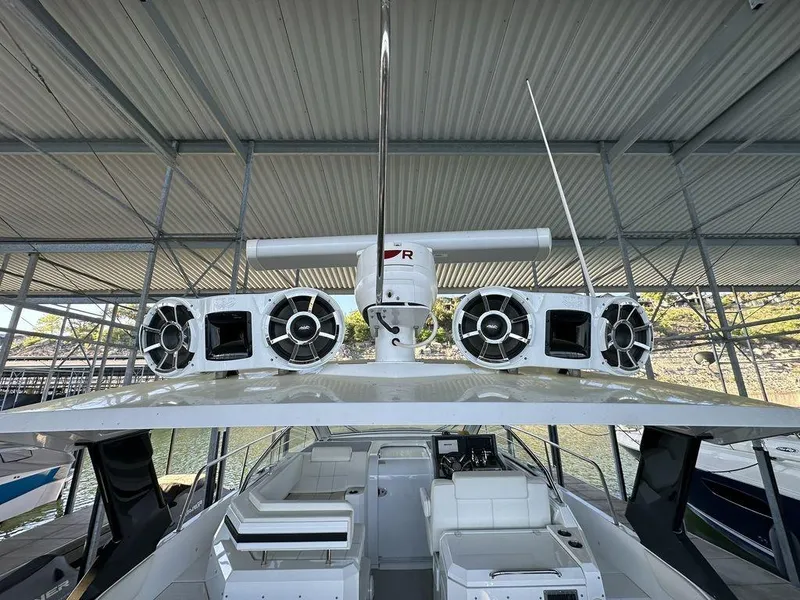 Slide: The Image of 2021 Cruisers Yachts 39 Express Coupe interior with modern seating and sleek design. - 12