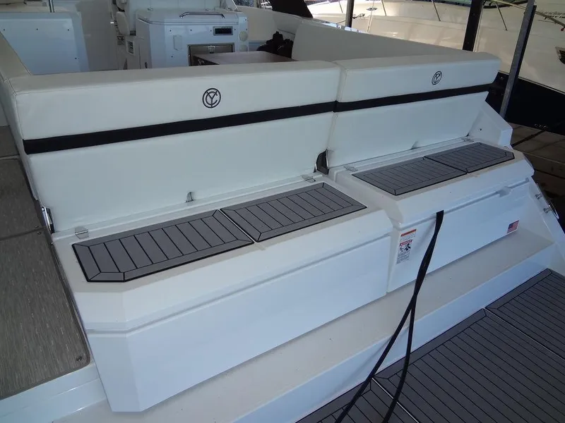 Slide: The Image of 2021 Cruisers Yachts 39 Express Coupe interior, featuring sleek seating and modern design. - 25