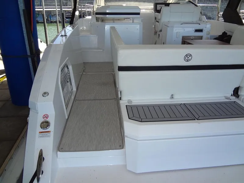 Slide: The Image of 2021 Cruisers Yachts 39 Express Coupe interior seating area. - 26