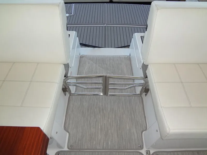 Slide: The Image of 2021 Cruisers Yachts 39 Express Coupe interior with kitchenette and storage. - 34