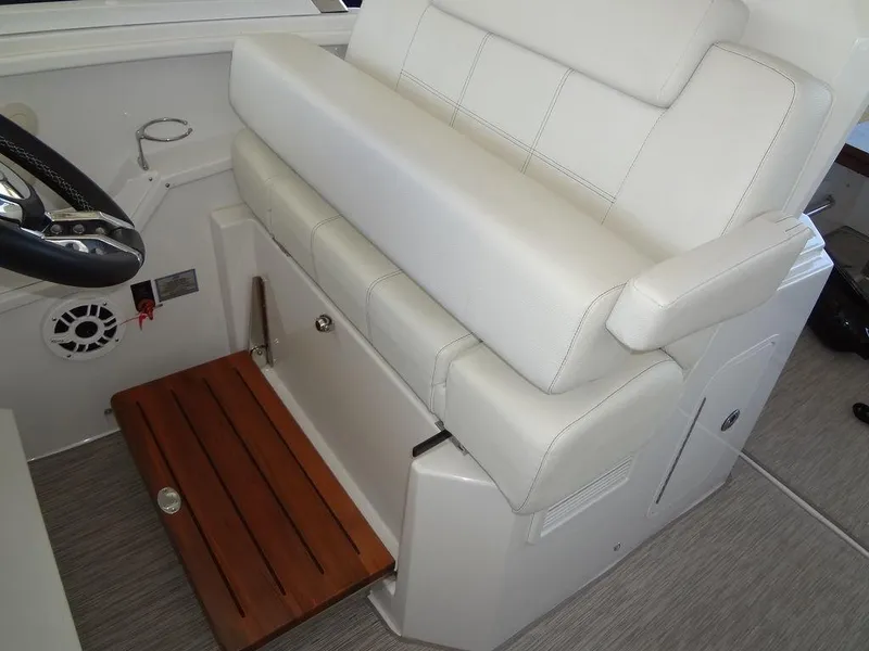 Slide: The Image of Helm of 2021 Cruisers Yachts 39 Express Coupe with modern controls and displays. - 42